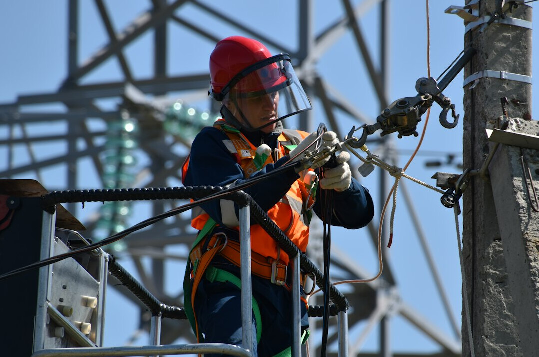 Broadcast engineer checking bonded cellular transmission equipment in a flight case