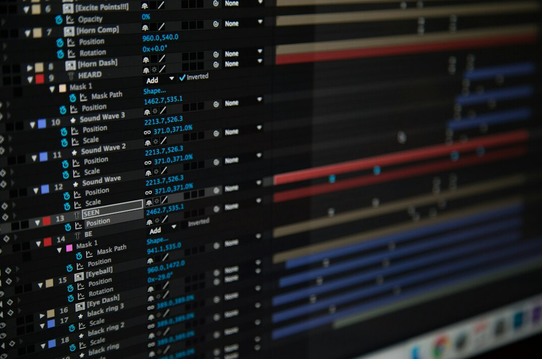 Video editor working on footage timelines at an editing workstation